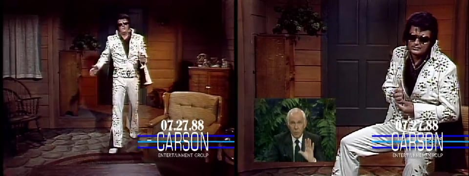 Johnny Carson interviewing Elvis in a wood cabin.